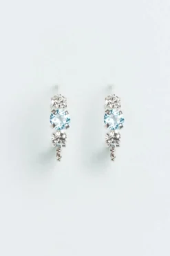 Wouters&Hendrix – oorringen met aquamarijn kristal en kristallen
