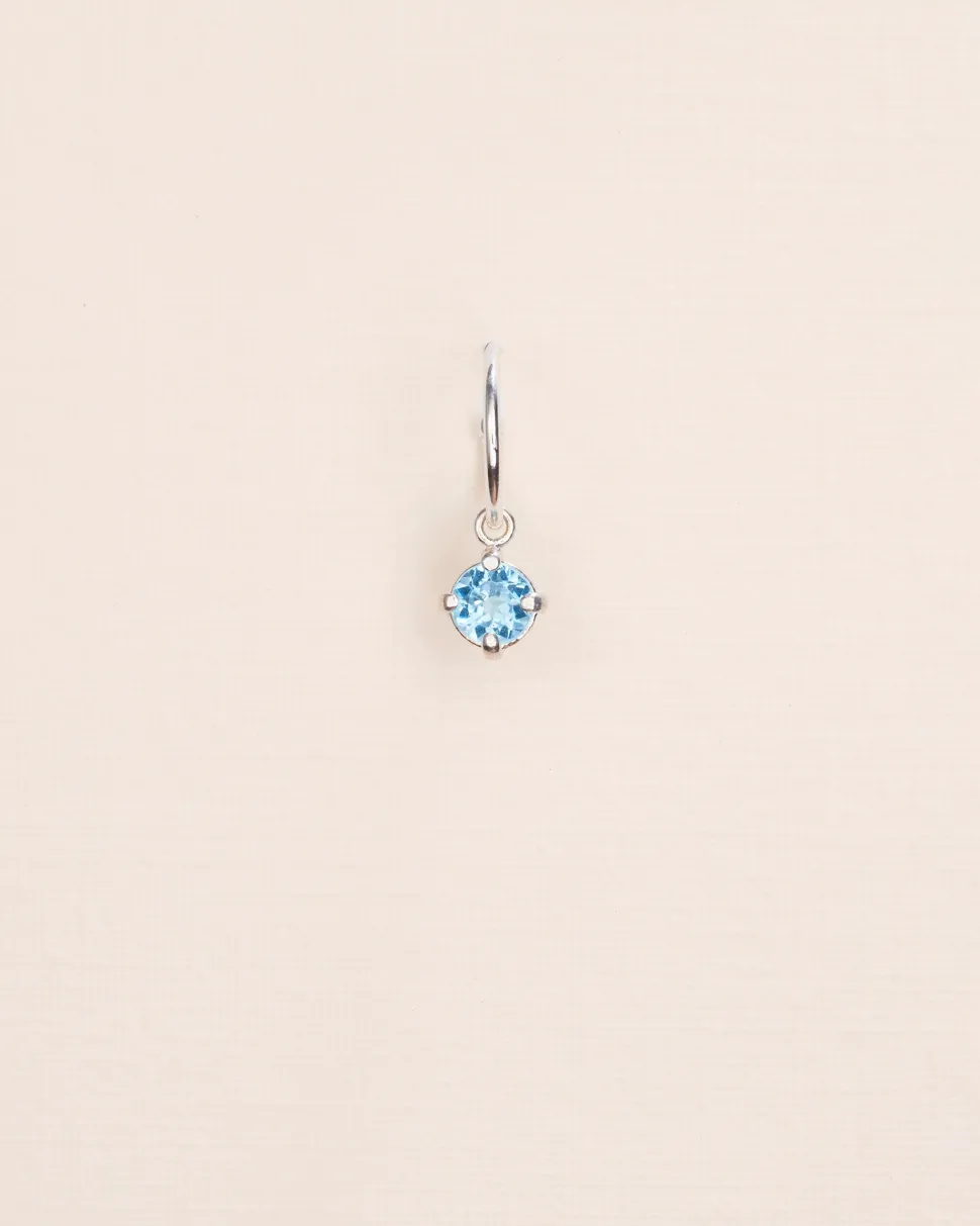 Wouters&Hendrix – single hoop met blauwe topaas