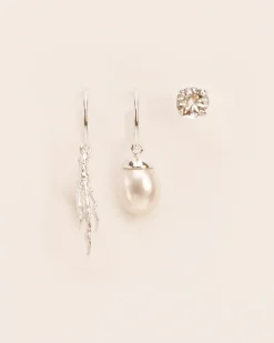 Wouters&Hendrix – trio van oorbellen met kraaienpoot, zoetwaterparel en kristal