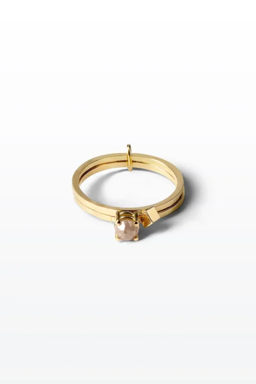 Lore Van Keer – dubbele 18K gouden ringen met witte diamant en cubic add on