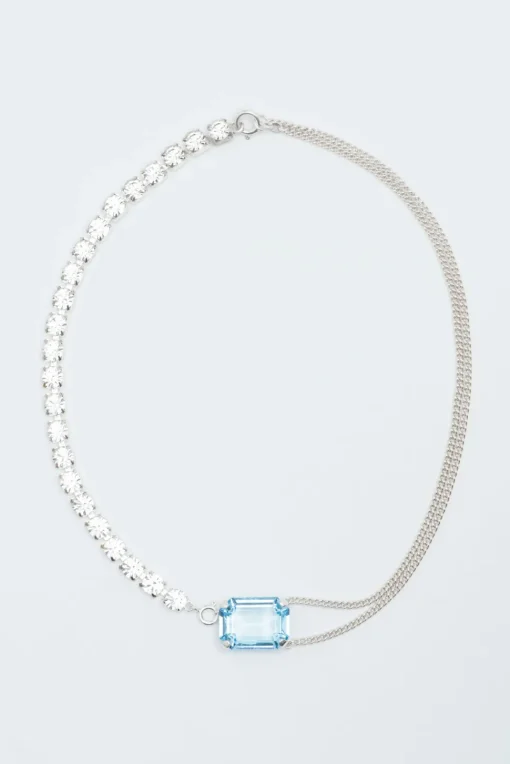 Wouters&Hendrix – statement ketting met aquamarijn kristal en kristallen